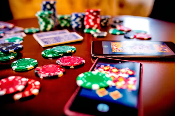 BAGI200 Jackpot Slots — Spin for massive rewards A dramatic shot of winning sevens landing on a slot reel surrounded by shining gold coins, symbolizing big wins.